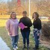 Union Primary School Principal Heather Sykes and teachers Tammy Barnett and Kim Stanley stand outside the school with a Bible. The staff and faculty collected 155 Bibles to donate to the Southwest Virginia Cancer Center.  PROVIDED BY TAMMY BARNETT