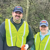 Brian Falin, the Appalachia coordinator for the town’s Great American Cleanup anti-litter campaign, poses Saturday with another volunteer. More than 150 volunteers took to the roads, streams and woods to clean up litter in Appalachia, Big Stone Gap, Coeburn, Norton, Pound, St. Paul and Wise. Approximately 300 bags of litter were filled. ‘We're really pleased with the number of people that came out,’ said Wise County Litter Prevention Coordinator Greg Cross.  SUBMITTED PHOTO